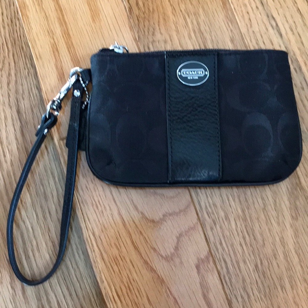 Authentic black Coach wristlet. Like new